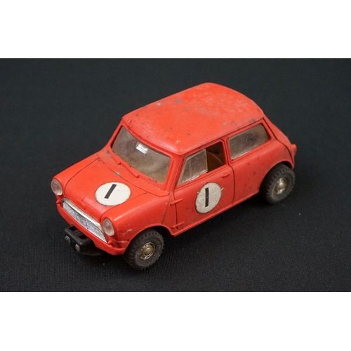 1245 - Five Triang Scalextric slot cars to include 2 x Austin Mini Cooper in green (missing a wheel) and re... 