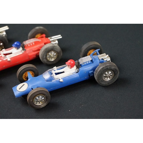 1245 - Five Triang Scalextric slot cars to include 2 x Austin Mini Cooper in green (missing a wheel) and re... 