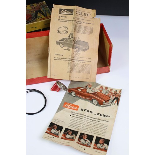 1278 - Original boxed Schuco 5735 Texi tin plate model in cream, female driver, with instructions and steer... 