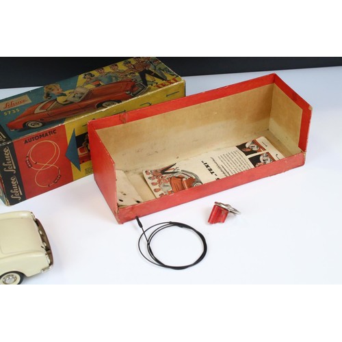 1278 - Original boxed Schuco 5735 Texi tin plate model in cream, female driver, with instructions and steer... 