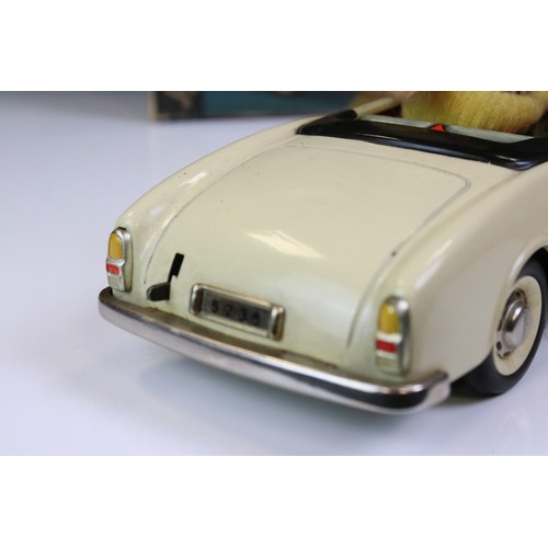 1278 - Original boxed Schuco 5735 Texi tin plate model in cream, female driver, with instructions and steer... 