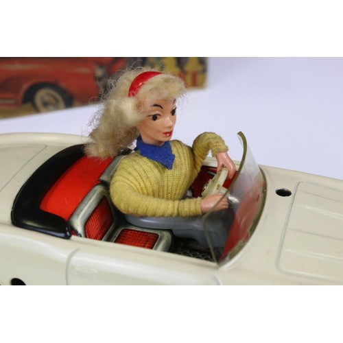 1278 - Original boxed Schuco 5735 Texi tin plate model in cream, female driver, with instructions and steer... 