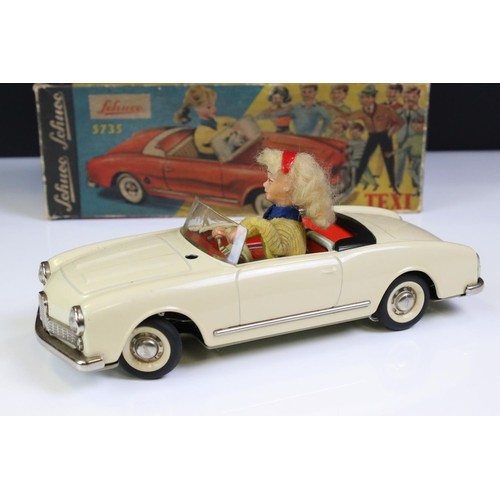 1278 - Original boxed Schuco 5735 Texi tin plate model in cream, female driver, with instructions and steer... 