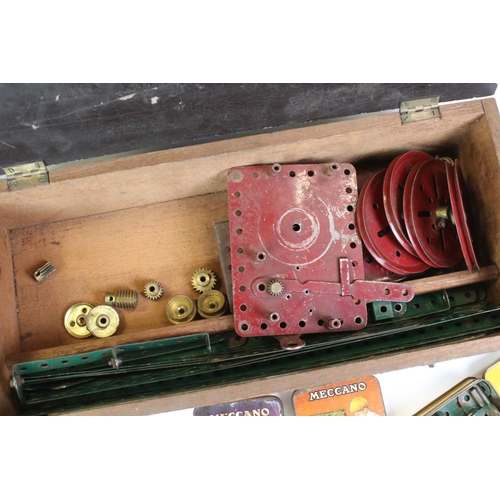 1369 - Meccano - Collection of vintage Meccano parts and accessories contained within a wooden box, featuri... 