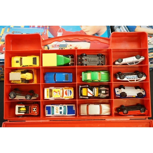 1180 - Three Matchbox carrycases enclosing a total of 50 diecast models, together with boxed Matchbox Motor... 