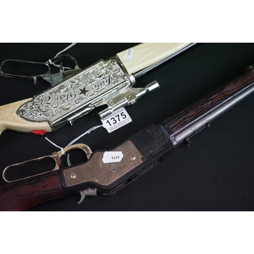 1375 - Two play worn Toy Guns to include Mettoy Winchester Saddle gun & DCMT Lone Star 73