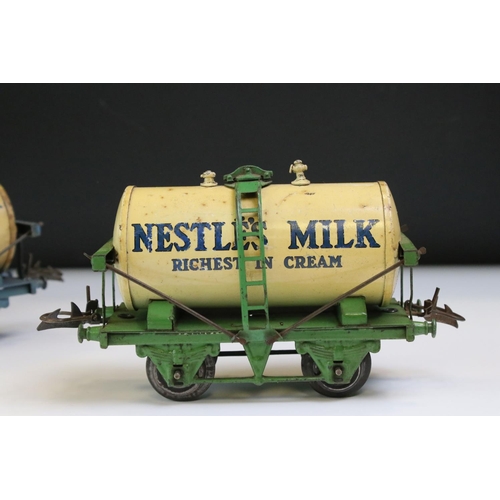 232 - Four Hornby O gauge Nestle Milk Tank Wagon to include green bed version, black bed version and 2 x b... 