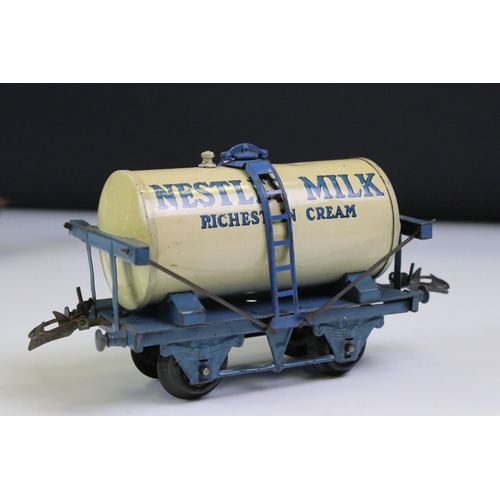 232 - Four Hornby O gauge Nestle Milk Tank Wagon to include green bed version, black bed version and 2 x b... 