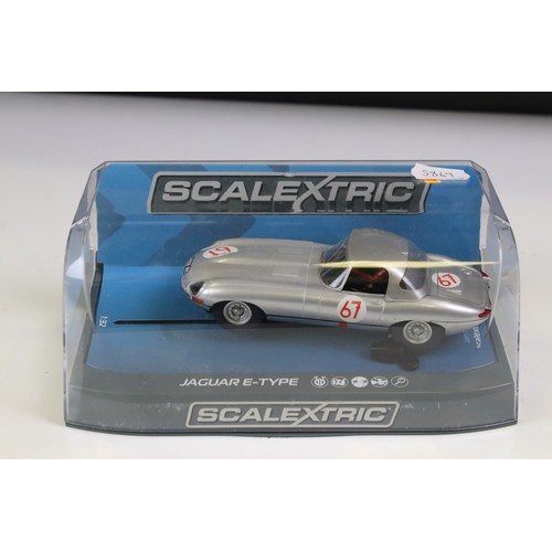 1033 - Four cased Scalextric slot cars to include C3722 Aston Martin DB5 red, C3952 Jaguar E Type Nurburgri... 