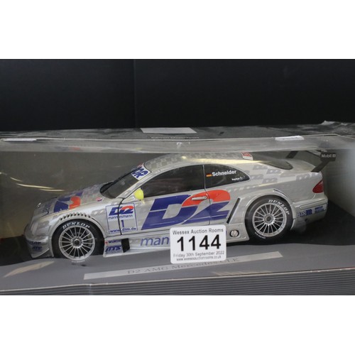 1144 - Two Boxed Mercedes-Benz Edition Motorsport 1/18 scale diecast models to include Service 24h AMG Merc... 