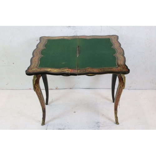 565 - 19th century French Tortoiseshell and Brass Marquetry Fold Over Card Table in the manner of Andre-Ch... 