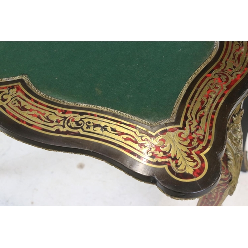 565 - 19th century French Tortoiseshell and Brass Marquetry Fold Over Card Table in the manner of Andre-Ch... 