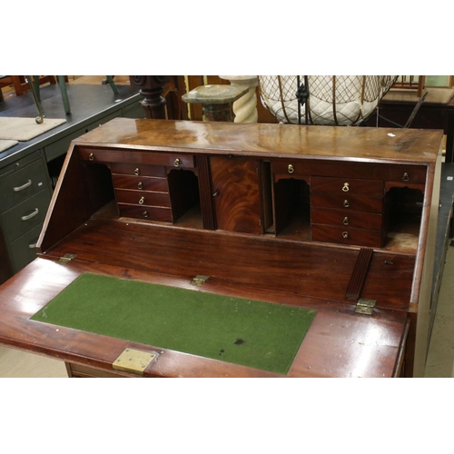 576 - George III Mahogany Bureau, the fall front opening to a fitted interior, four long drawers and raise... 