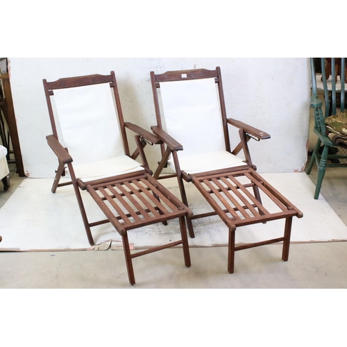 634 - Pair of Hardwood Folding Steamer Chairs with detachable foot rests and new cream canvas seats