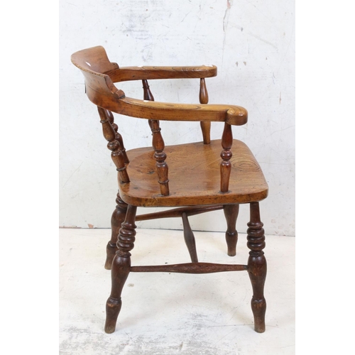 643 - 19th century Elm Seated Tub / Captain's Chair with turned spindle back, 59cm wide x 83cm high