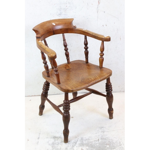 643 - 19th century Elm Seated Tub / Captain's Chair with turned spindle back, 59cm wide x 83cm high