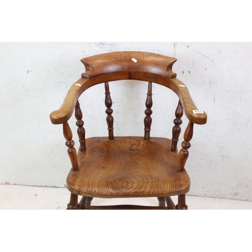 643 - 19th century Elm Seated Tub / Captain's Chair with turned spindle back, 59cm wide x 83cm high