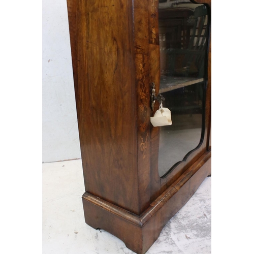 645 - Victorian Walnut Pier Display Cabinet, with floral marquetry inlay, the single glazed door opening t... 