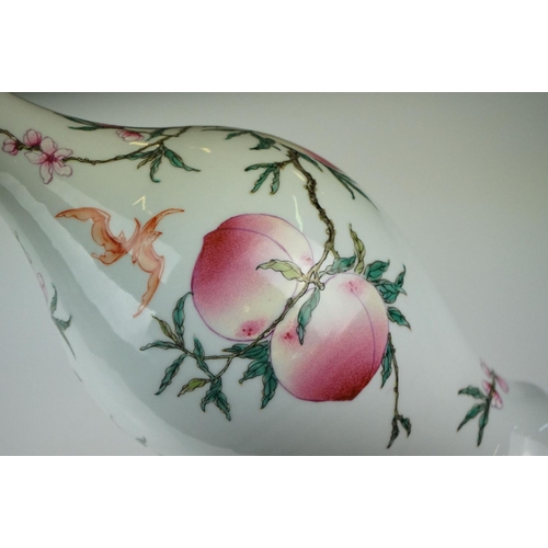 10 - 20th century Chinese Porcelain Baluster Vase decorated in enamels with flowering peach branches, six... 