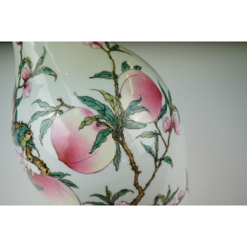 10 - 20th century Chinese Porcelain Baluster Vase decorated in enamels with flowering peach branches, six... 