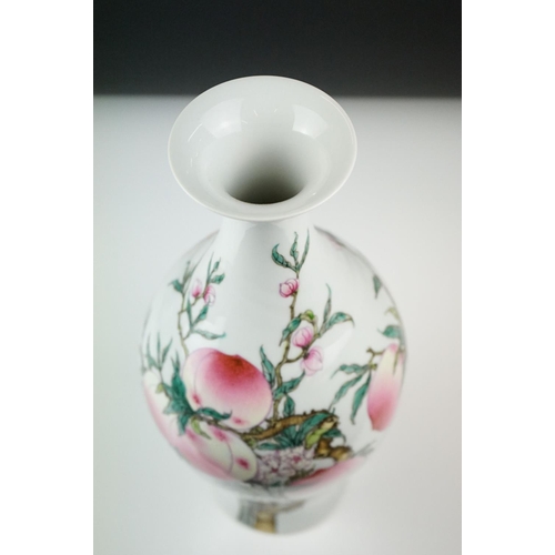 10 - 20th century Chinese Porcelain Baluster Vase decorated in enamels with flowering peach branches, six... 