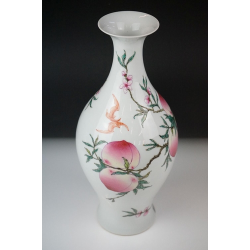 10 - 20th century Chinese Porcelain Baluster Vase decorated in enamels with flowering peach branches, six... 