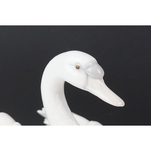 16 - Lladro porcelain figure of a swan swimming, model no. 5231, approx 18.5cm high