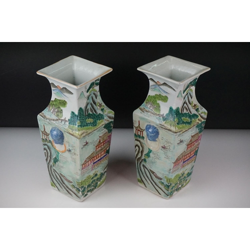 18 - Pair of Chinese Porcelain Famille Verte Square Baluster Vases decorated with figures fishing and bui... 