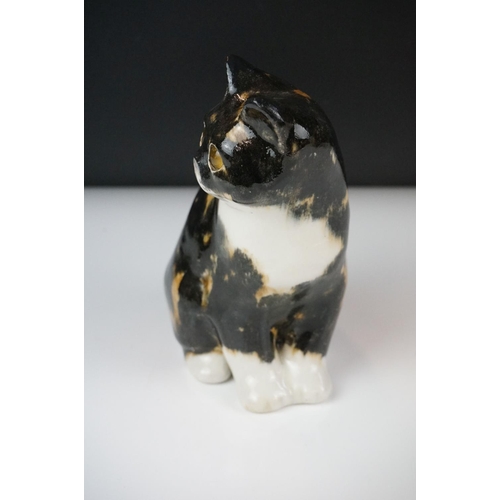 27 - Winstanley pottery figure of a seated tabby cat with glass eyes, size 2, signed Winstanley to base, ... 