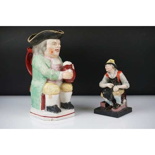 28 - 19th Century Staffordshire Toby jug modelled as Toby Philpott holding a foaming tankard and pipe, ap... 