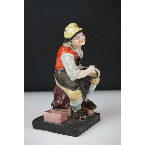 28 - 19th Century Staffordshire Toby jug modelled as Toby Philpott holding a foaming tankard and pipe, ap... 