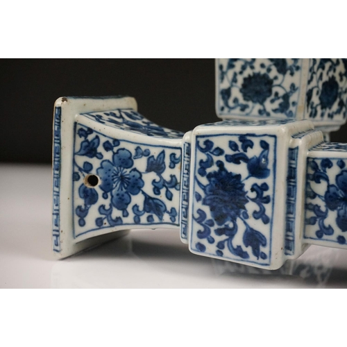 3 - Two similar Chinese ' Gu ' shaped Blue and White Vases decorated with flowers, square white metal ri... 