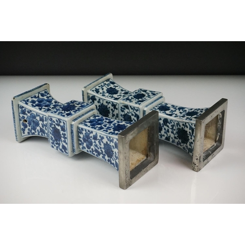 3 - Two similar Chinese ' Gu ' shaped Blue and White Vases decorated with flowers, square white metal ri... 