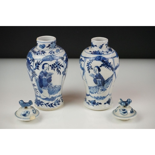 34 - Near Pair of Chinese Blue and White Baluster Lidded Vases decorated with figures and birds, four cha... 