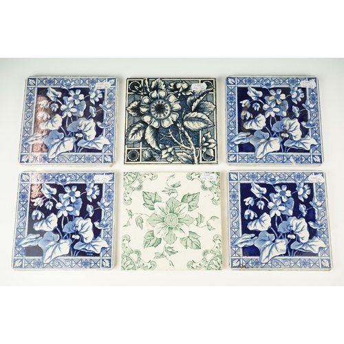 38 - Group of six Victorian floral design ceramic tiles, comprising a set of four & two others, one inscr... 