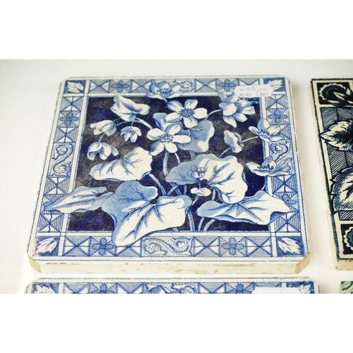 38 - Group of six Victorian floral design ceramic tiles, comprising a set of four & two others, one inscr... 