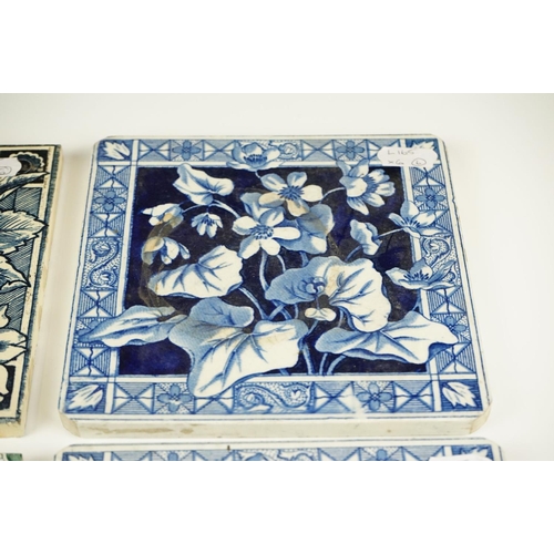 38 - Group of six Victorian floral design ceramic tiles, comprising a set of four & two others, one inscr... 