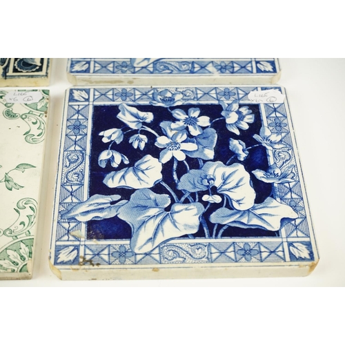 38 - Group of six Victorian floral design ceramic tiles, comprising a set of four & two others, one inscr... 