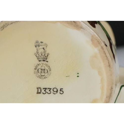 47 - Royal Doulton Golfing Series Ware jug and plate, the jug depicting two golfers with motto ' To Laugh... 