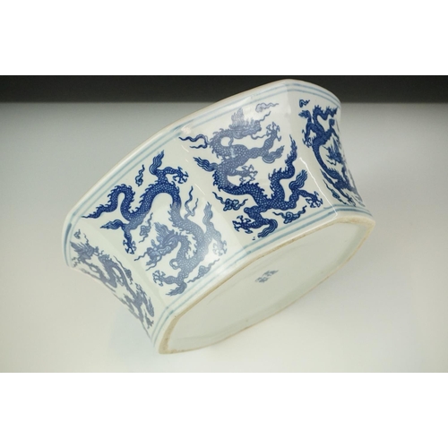 48 - Chinese Porcelain Octagonal Blue and White Bowl decorated with dragons, four character marks to base... 