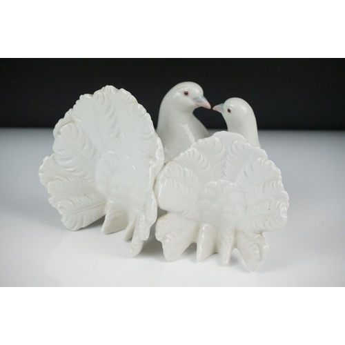 51 - Lladro ' Kissing Doves ' figure group no. 1169, 12cm high, together with two Nao by Lladro porcelain... 