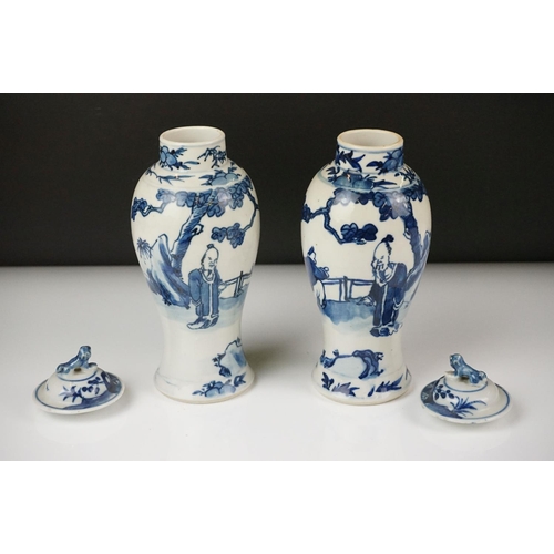 52 - Chinese Porcelain Blue and White five piece Garniture decorated with figures comprising two sleeve v... 