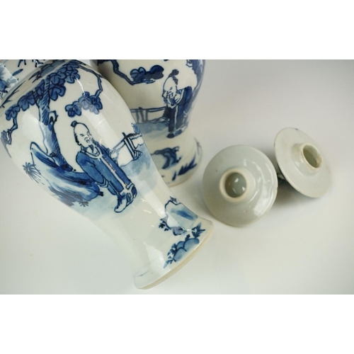 52 - Chinese Porcelain Blue and White five piece Garniture decorated with figures comprising two sleeve v... 