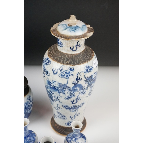 58 - Collection of Chinese Ceramics including Gu Shaped Blue and White Vases with four Kangxi marks to ba... 