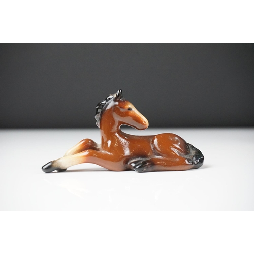 59 - Seven Beswick porcelain foals, mostly brown gloss examples, tallest approx 13cm, all with printed ma... 