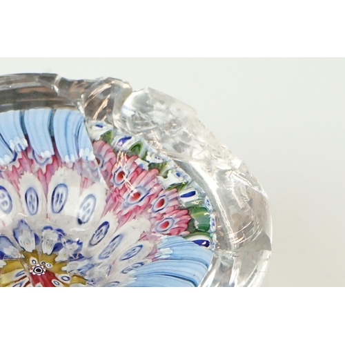 62 - Four glass paperweights to include 3 millefiori examples, featuring a Perthshire paperweight with la... 