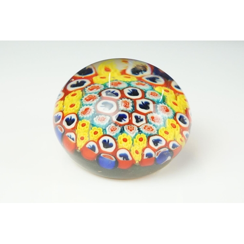 62 - Four glass paperweights to include 3 millefiori examples, featuring a Perthshire paperweight with la... 