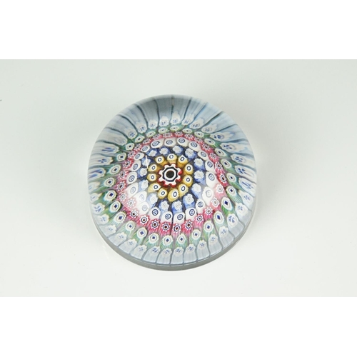 62 - Four glass paperweights to include 3 millefiori examples, featuring a Perthshire paperweight with la... 