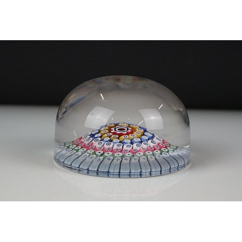 62 - Four glass paperweights to include 3 millefiori examples, featuring a Perthshire paperweight with la... 