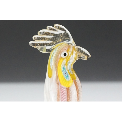 63 - Glass Cockatiel with white and pink latticino canes and millefiori decoration to the face, pontil to... 